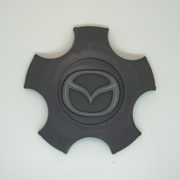 Tapabujes Mazda 6 color gris logo gris. 4 unidades - Imagen 2